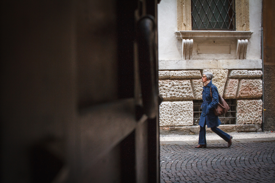 Lady walking in Verona